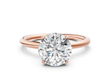 Rose gold Round Solitaire Diamond Ring with a Classic Band and Four-Prong Setting