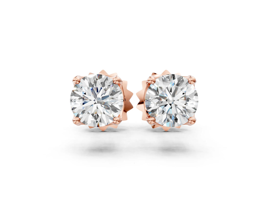 10K Rose Gold 0.56 Carat F-G VS-SI Round Solitaire Diamond Stud Earrings with Four-Prong Basket Setting