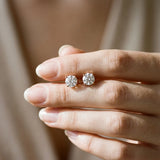 10K Rose Gold 0.56 Carat F-G VS-SI Round Solitaire Diamond Stud Earrings with Four-Prong Basket Setting