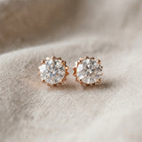 10K Rose Gold 0.56 Carat F-G VS-SI Round Solitaire Diamond Stud Earrings with Four-Prong Basket Setting