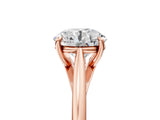 Rose gold Round Solitaire Engagement Ring with Four-Prong Setting and Classic Band