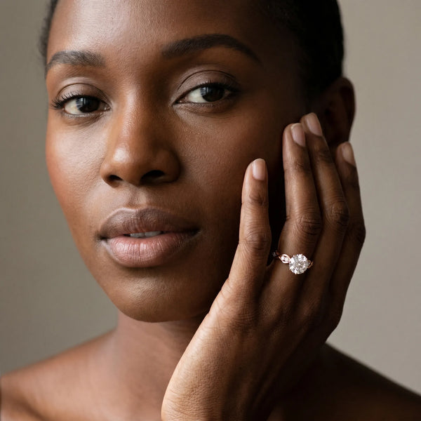 Rose gold Round Solitaire Twist Band with Leaf Prong Setting