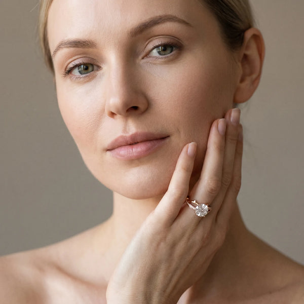 Rose gold Round Solitaire Twist Band with Pavé Accents and Four-Prong Setting