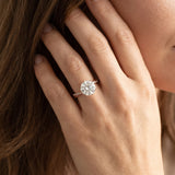 Rose gold Round Solitaire Twist Band with Pavé Diamonds and Four-Prong Setting_93