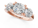 Rose gold Three-Stone Cushion Brilliant Cut Solitaire Ring with Prong Setting on a Classic Band 1