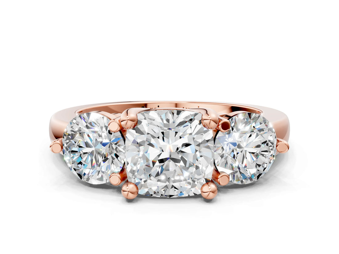 Rose gold Three-Stone Cushion Brilliant Cut Solitaire Ring with Prong Setting on a Classic Band