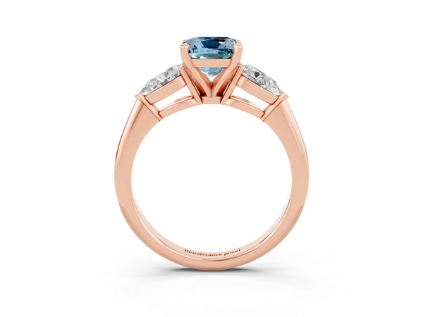 Rose gold Three-Stone Cushion Cut Aquamarine Ring with Pear Side Stones and Four-Prong Setting