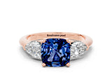 Rose gold Three-Stone Cushion Cut Blue Sapphire Ring with Pear Side Stones and Four-Prong Setting