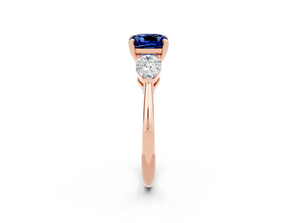 Rose gold Three-Stone Cushion Cut Blue Sapphire Ring with Pear Side Stones and Four-Prong Setting