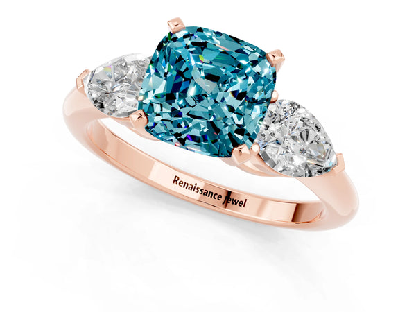 Rose gold Three-Stone Cushion Cut Blue Topaz Ring with Pear Side Stones and Four-Prong Setting