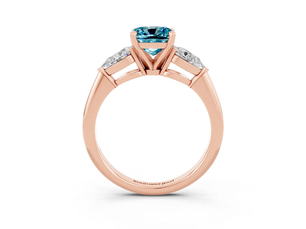 Rose gold Three-Stone Cushion Cut Blue Topaz Ring with Pear Side Stones and Four-Prong Setting