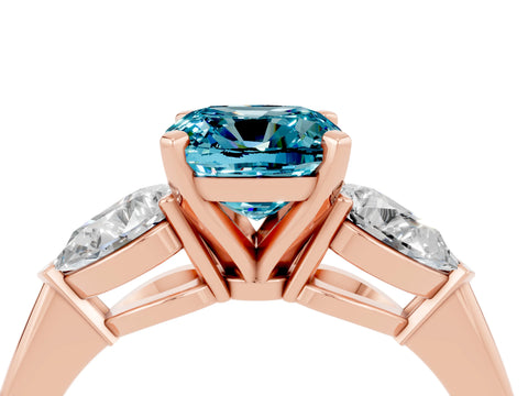 Rose gold Three-Stone Cushion Cut Blue Topaz Ring with Pear Side Stones and Four-Prong Setting_4