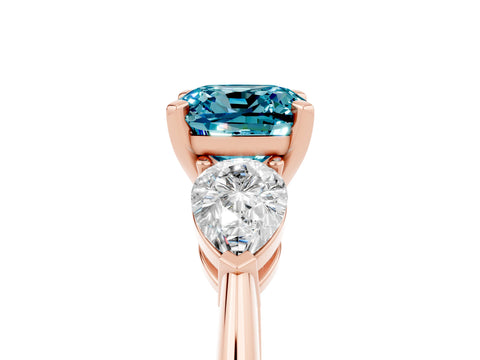Rose gold Three-Stone Cushion Cut Blue Topaz Ring with Pear Side Stones and Four-Prong Setting_5