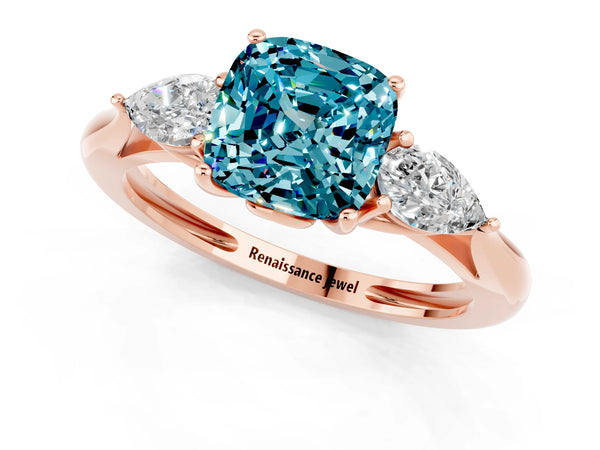 Rose gold Three-Stone Cushion Cut Blue Topaz Ring with Pear  Side Stones in Four-Prong Setting