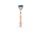 Rose gold Three-Stone Cushion Cut Blue Topaz Ring with Pear  Side Stones in Four-Prong Setting_14