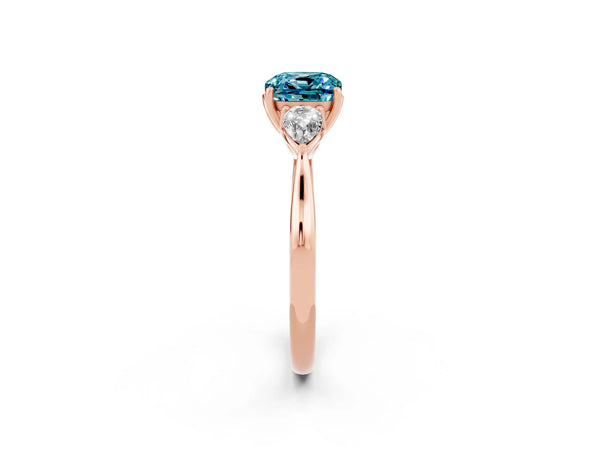 Rose gold Three-Stone Cushion Cut Blue Topaz Ring with Pear  Side Stones in Four-Prong Setting