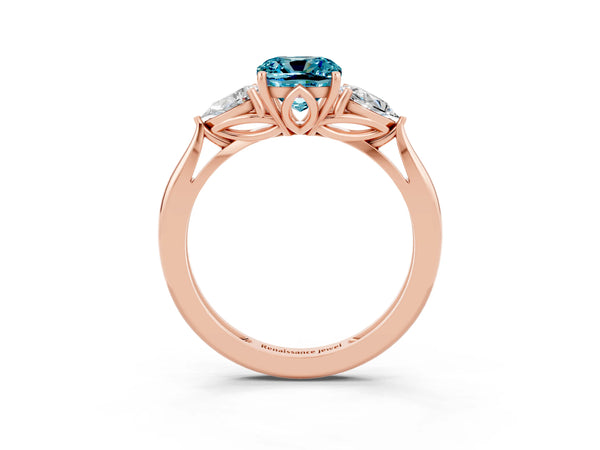 Rose gold Three-Stone Cushion Cut Blue Topaz Ring with Pear  Side Stones in Four-Prong Setting