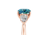 Rose gold Three-Stone Cushion Cut Blue Topaz Ring with Pear  Side Stones in Four-Prong Setting_17