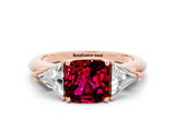 Rose gold Three-Stone Cushion Cut Cut Diamond Ring with Trillion Side Stones and Four-Prong Setting
