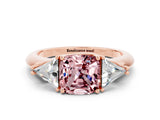 Rose gold Three-Stone Cushion Cut Cut Diamond Ring with Trillion Side Stones and Four-Prong Setting