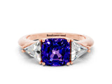 Rose gold Three-Stone Cushion Cut Cut Diamond Ring with Trillion Side Stones and Four-Prong Setting