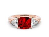 Rose gold Three-Stone Cushion Cut Cut Diamond Ring with Trillion Side Stones and Four-Prong Setting