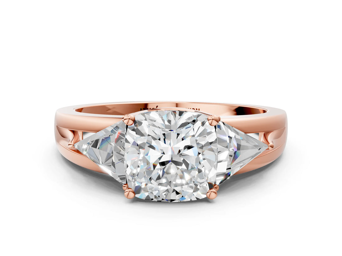 Rose gold Three-Stone Cushion Cut Cut Diamond Ring with Trillion Side Stones on a Split Shank Band_13