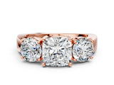 Rose gold Three-Stone Cushion Cut Diamond Ring with Round Side Stones, Classic Band, and Four-Prong Setting_3