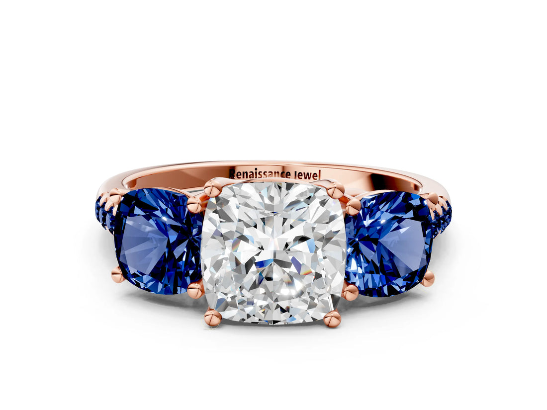 Rose gold Three-Stone Cushion Cut Diamond Ring with Round with Blue Sapphire side stone Pavé Band and Prong Setting