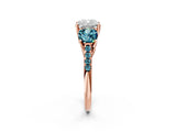 Rose gold Three-Stone Cushion Cut Diamond Ring with Round with Blue Topaz side stone Pavé Band and Prong Setting_2