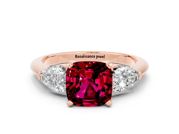 Rose gold Three-Stone Cushion Cut Garnet Ring with Pear Side Stones and Four-Prong Setting