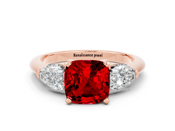 Rose gold Three-Stone Cushion Cut Ruby Ring with Pear Side Stones and Four-Prong Setting