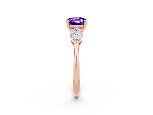 Rose gold Three-Stone Cushion Cut Tanzanite Ring with Pear Side Stones and Four-Prong Setting