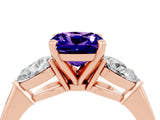 Rose gold Three-Stone Cushion Cut Tanzanite Ring with Pear Side Stones and Four-Prong Setting_4