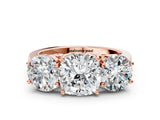 Rose gold Three-Stone Cushion Diamond Engagement Ring with Prong Setting on a Classic Band_11