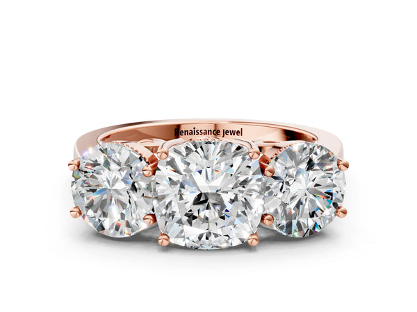 Rose gold Three-Stone Cushion Diamond Engagement Ring with Prong Setting on a Classic Band