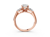 Rose gold Three-Stone Cushion Diamond Ring with Pear Side Stones in Four-Prong Setting_52