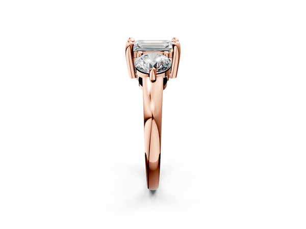 Rose gold Three-Stone Emerald Brilliant Cut Solitaire Ring with Prong Setting on a Classic Band