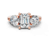 Rose gold Three-Stone Emerald Brilliant Cut Solitaire Ring with Prong Setting on a Classic Band