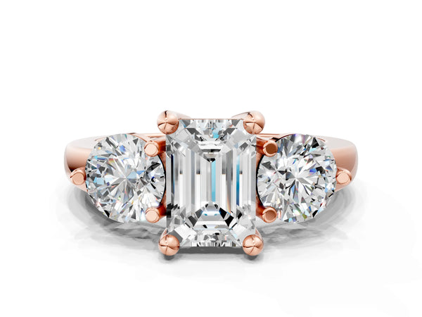 Rose gold Three-Stone Emerald Brilliant Cut Solitaire Ring with Prong Setting on a Classic Band