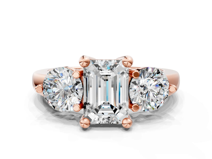 Rose gold Three-Stone Emerald Brilliant Cut Solitaire Ring with Prong Setting on a Classic Band