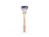 Rose gold Three-Stone Emerald Cut Aquamarine Ring with Pear Side Stones and Four-Prong Setting_2