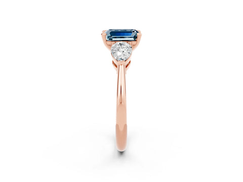 Rose gold Three-Stone Emerald Cut Aquamarine Ring with Pear Side Stones and Four-Prong Setting_2