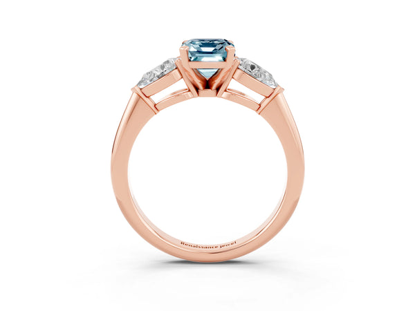 Rose gold Three-Stone Emerald Cut Aquamarine Ring with Pear Side Stones and Four-Prong Setting