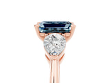Rose gold Three-Stone Emerald Cut Aquamarine Ring with Pear Side Stones and Four-Prong Setting_5
