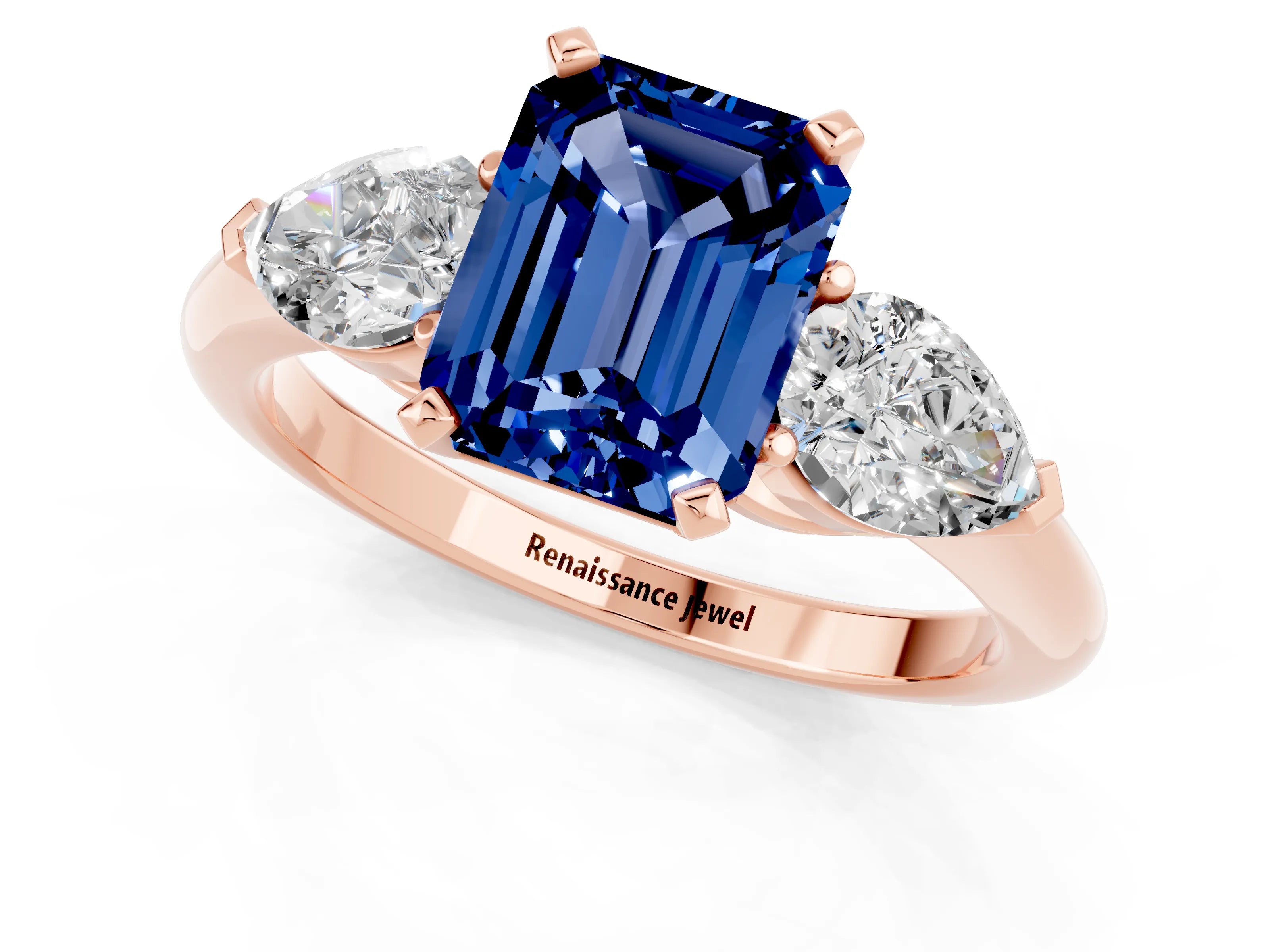 Rose gold Three-Stone Emerald Cut Blue Sapphire Ring with Pear Side Stones and Four-Prong Setting_1