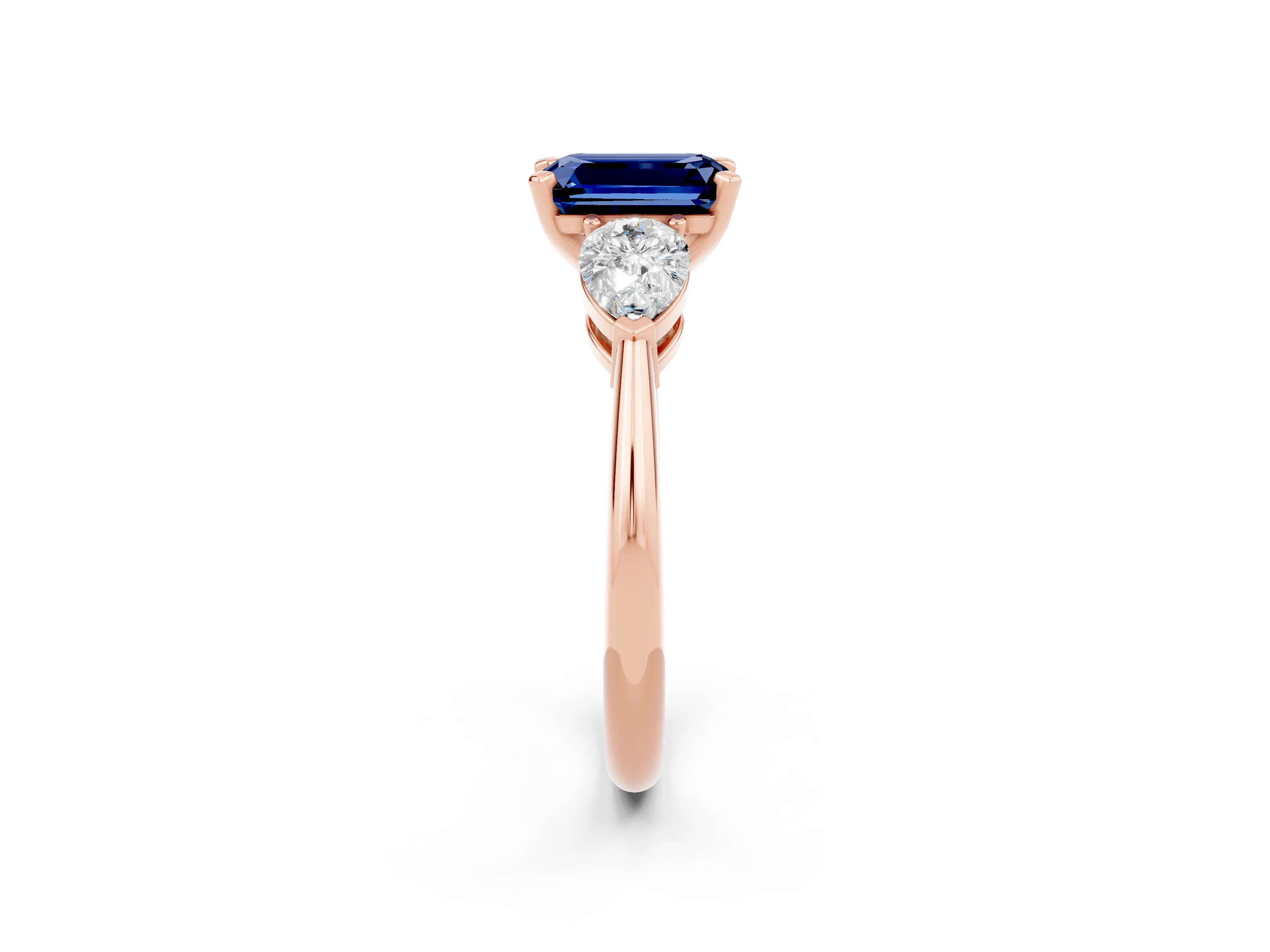 Rose gold Three-Stone Emerald Cut Blue Sapphire Ring with Pear Side Stones and Four-Prong Setting_2