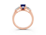 Rose gold Three-Stone Emerald Cut Blue Sapphire Ring with Pear Side Stones and Four-Prong Setting_3