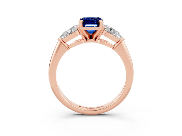 Rose gold Three-Stone Emerald Cut Blue Sapphire Ring with Pear Side Stones and Four-Prong Setting