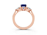 Rose gold Three-Stone Emerald Cut Blue Sapphire Ring with Pear  Side Stones in Four-Prong Setting_39